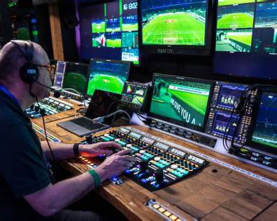Professional video control room with multiple monitors and mixing equipment - IMAG multicam production Los Angeles